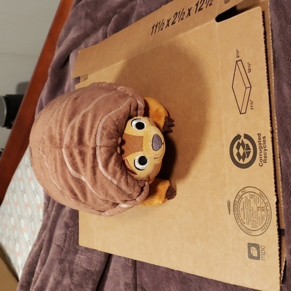 Disney fold and roll tuk tuk plush